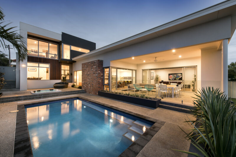 Residential Attitudes - Swimming pool with porch and down-lights