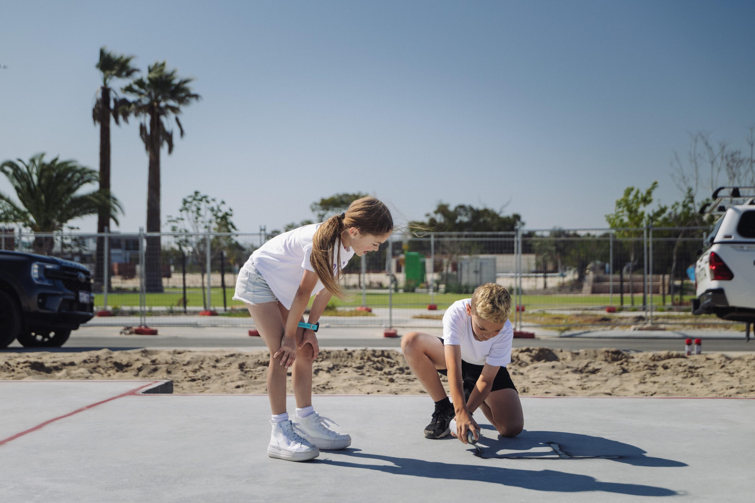 Children playing on a new home slab at a Perth estate