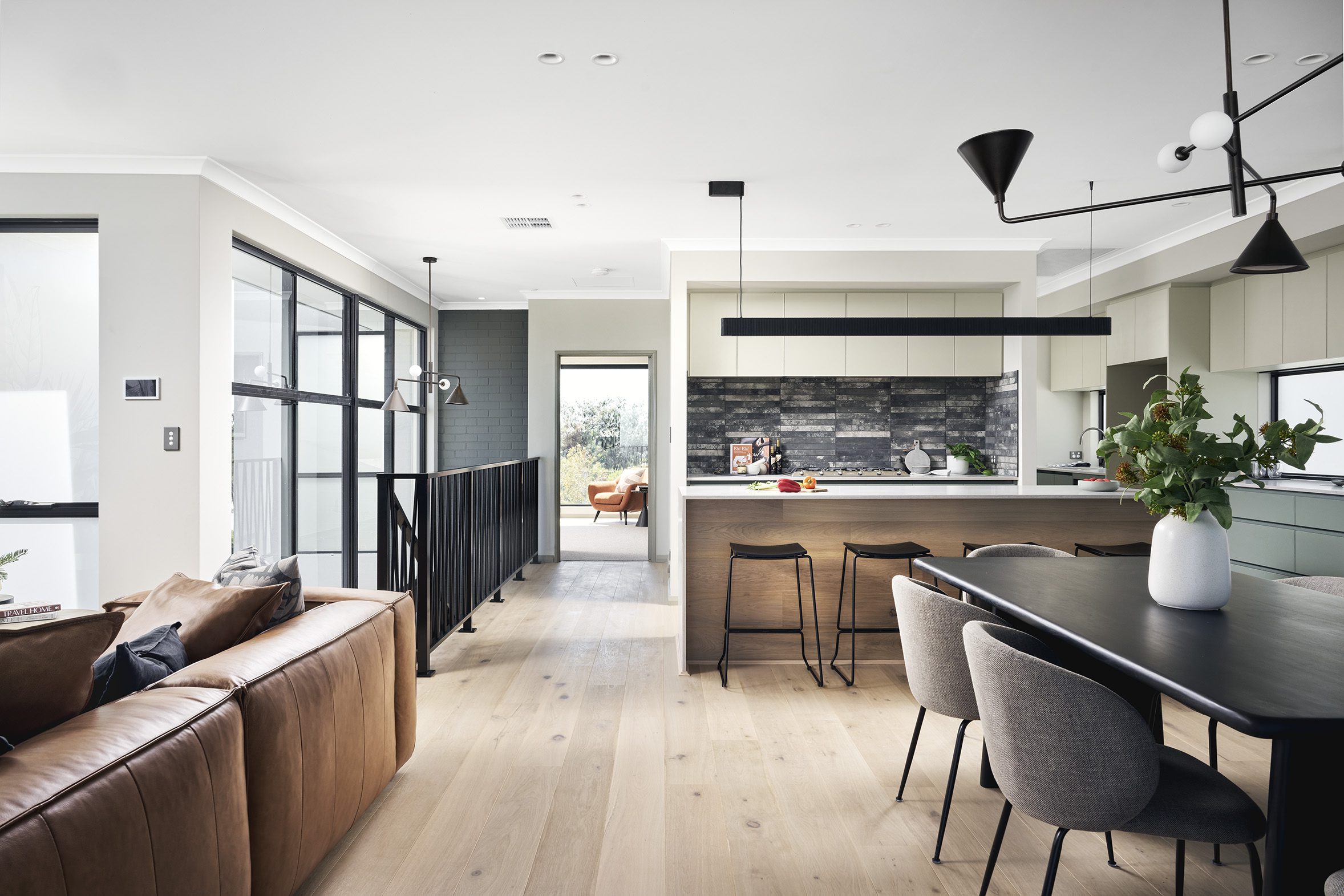 Reverse-living home design with the kitchen and dining located upstairs. Built by Residential Attitudes.