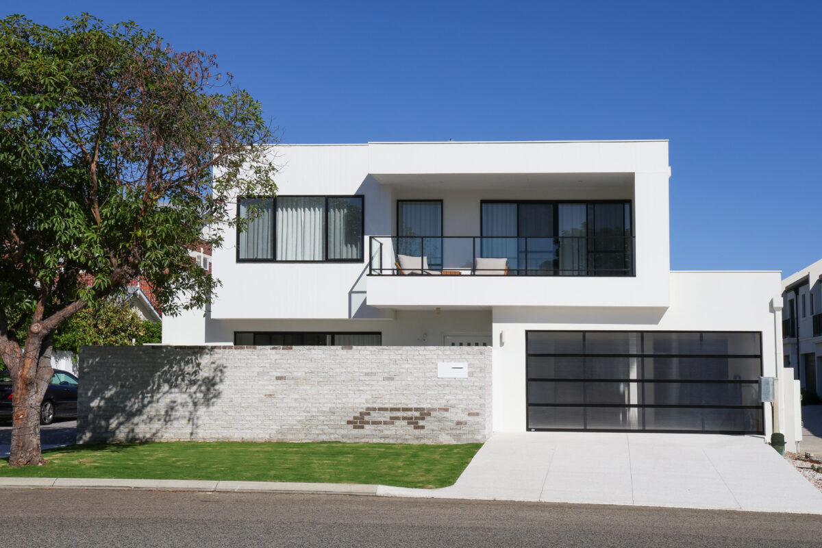 Double storey home with sharp structural lines.