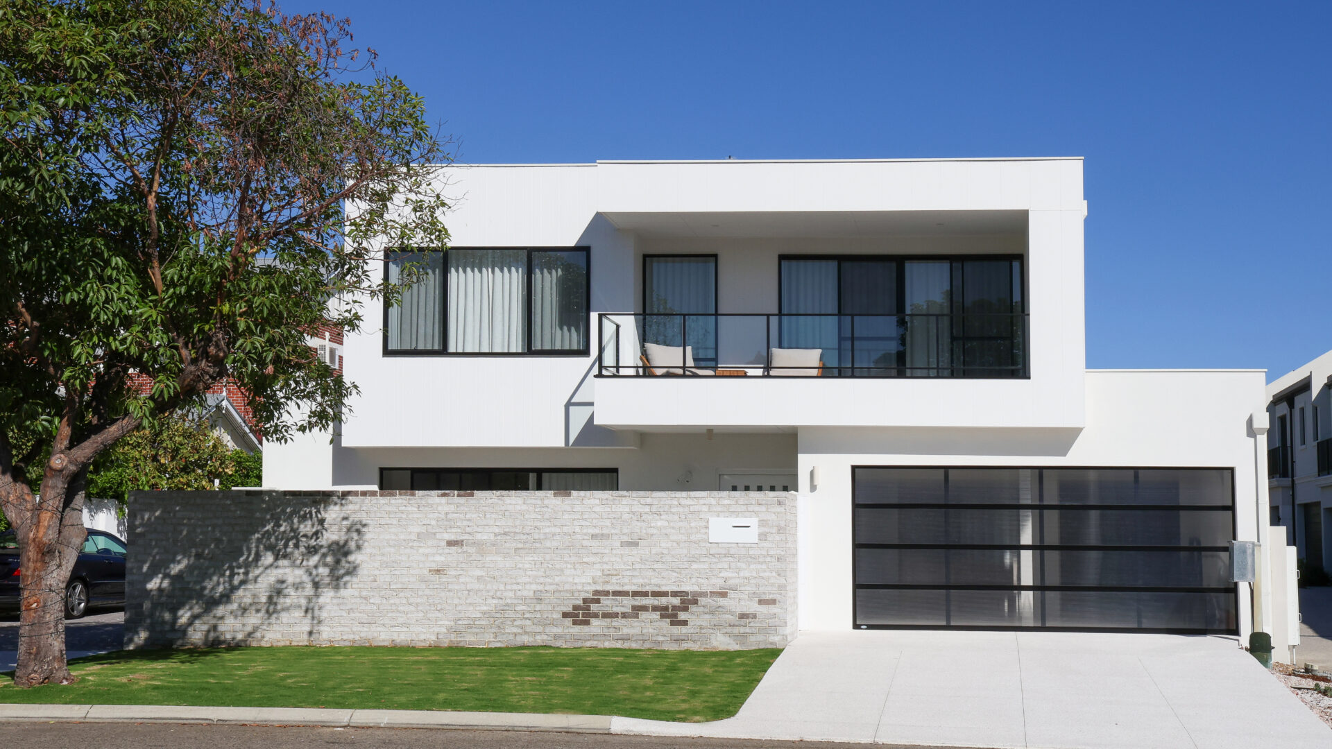 Double storey home with sharp structural lines.