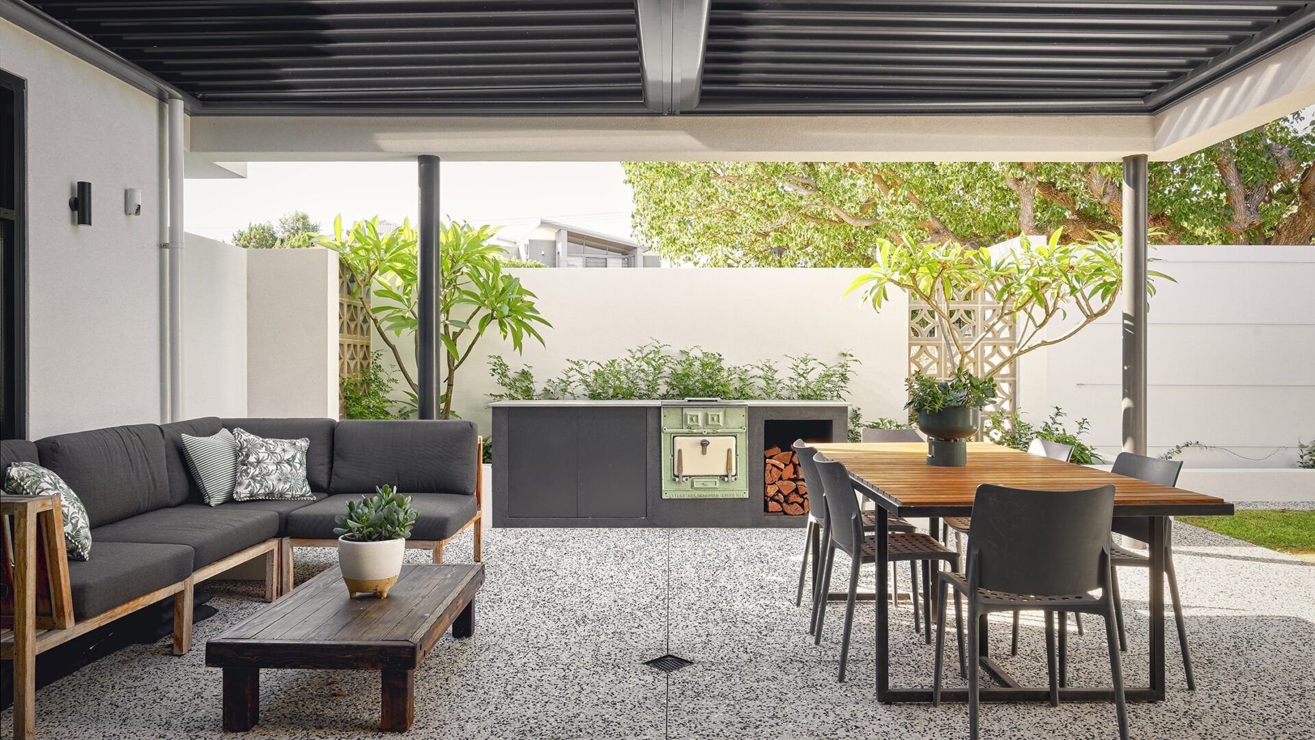 The photo shows an outdoor entertaining areas with an outdoor kitchen for our North Perth clients. Our clients share their experience and review Residential Attitudes.