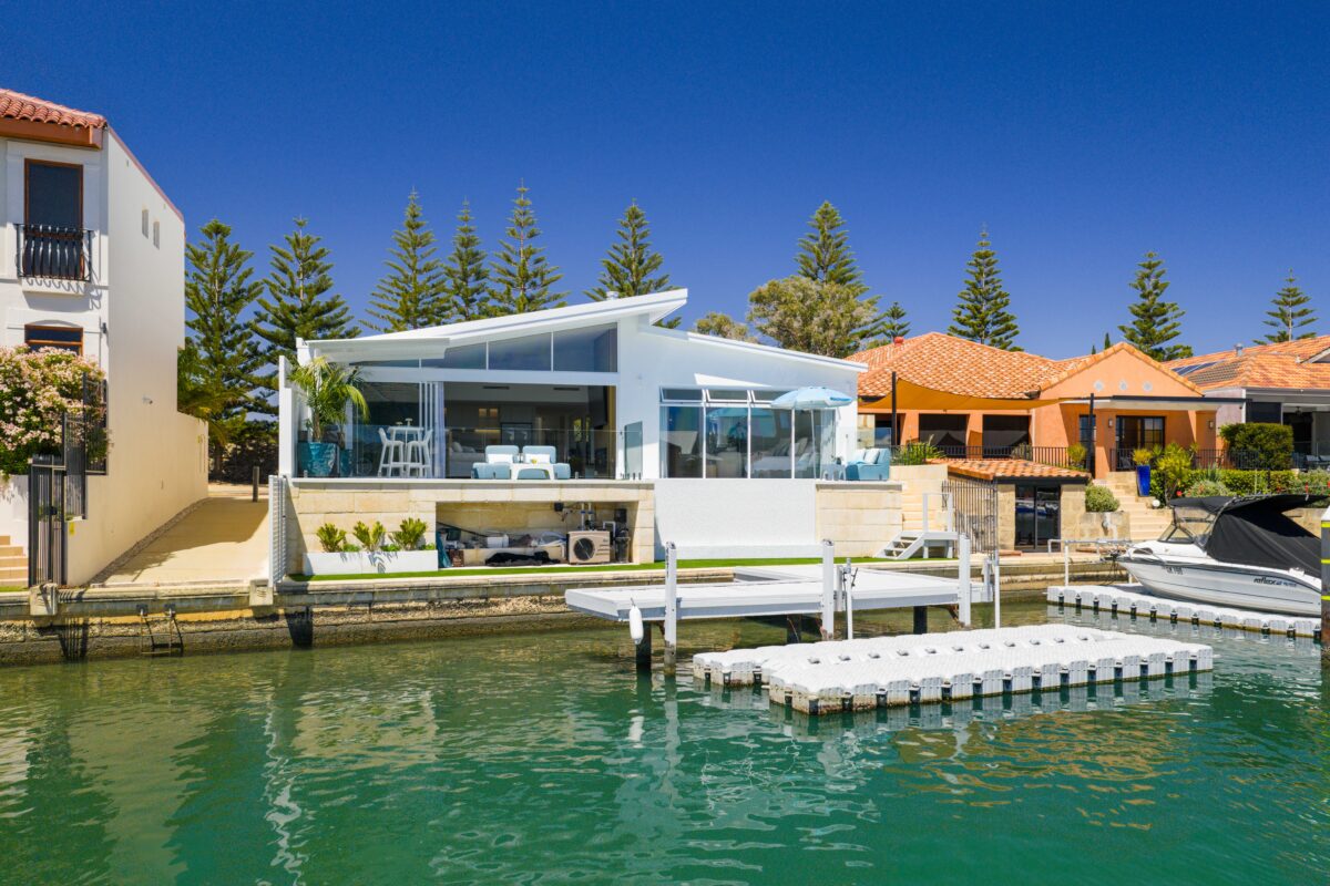 Client home built in Halls Head, Western Australia, on the canals. The home overlooks the canal from the backyard space. Built by Residential Attitudes.