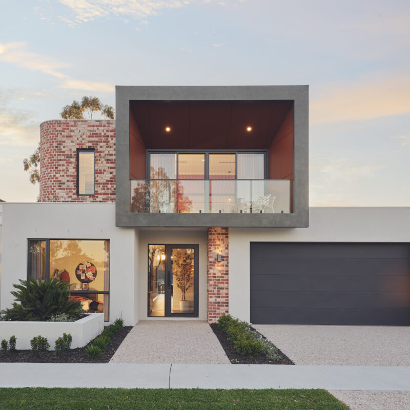 Double storey display home with feature curved wall and brick facade, in Jandakot - the Glen Iris display. Built by Residential Attitudes.
